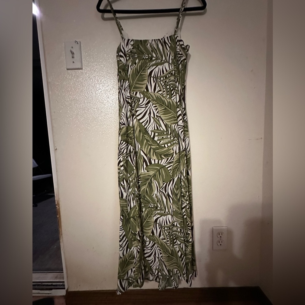 Mahina brand. New with tags beautiful dress from Hawaii. Size medium